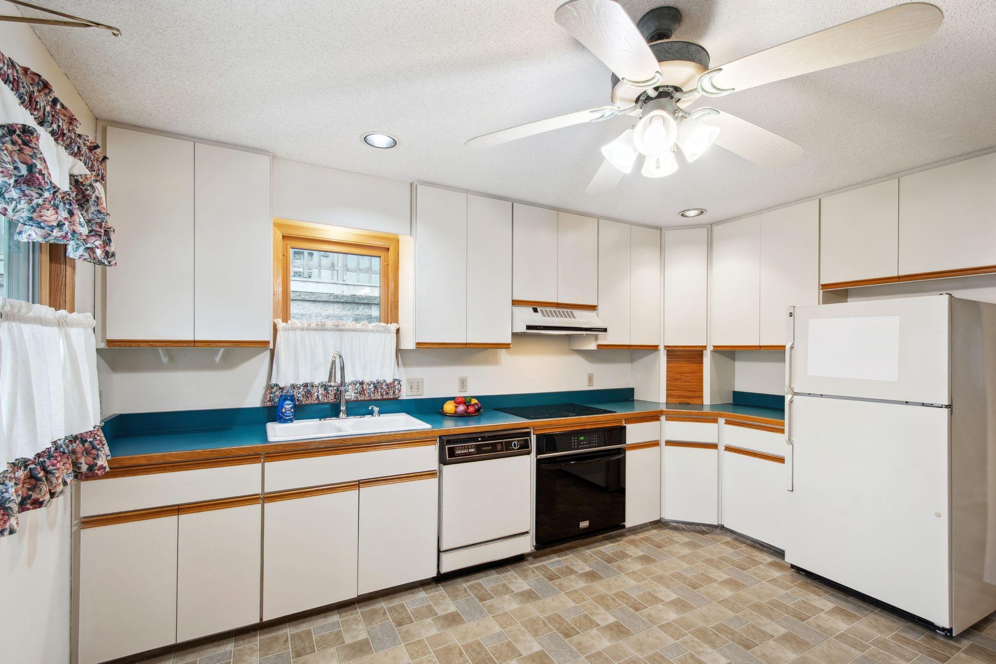 Kitchen with lots of cupboards for storage