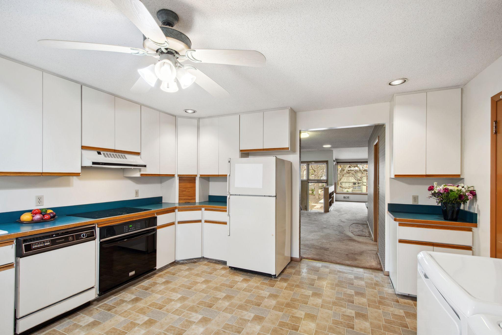 View from kitchen into dining room to the front of the house