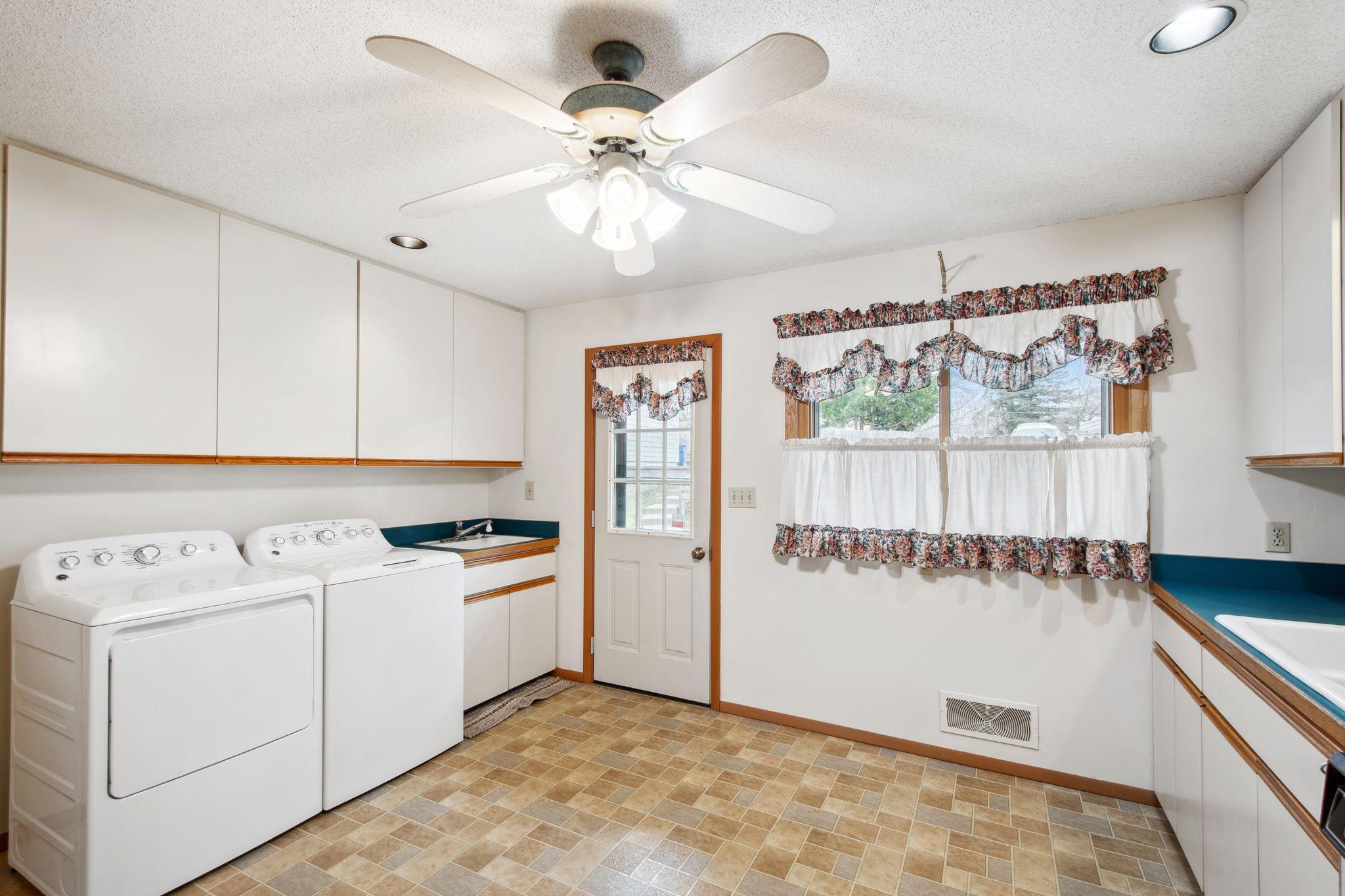 The laundry is in the kitchen