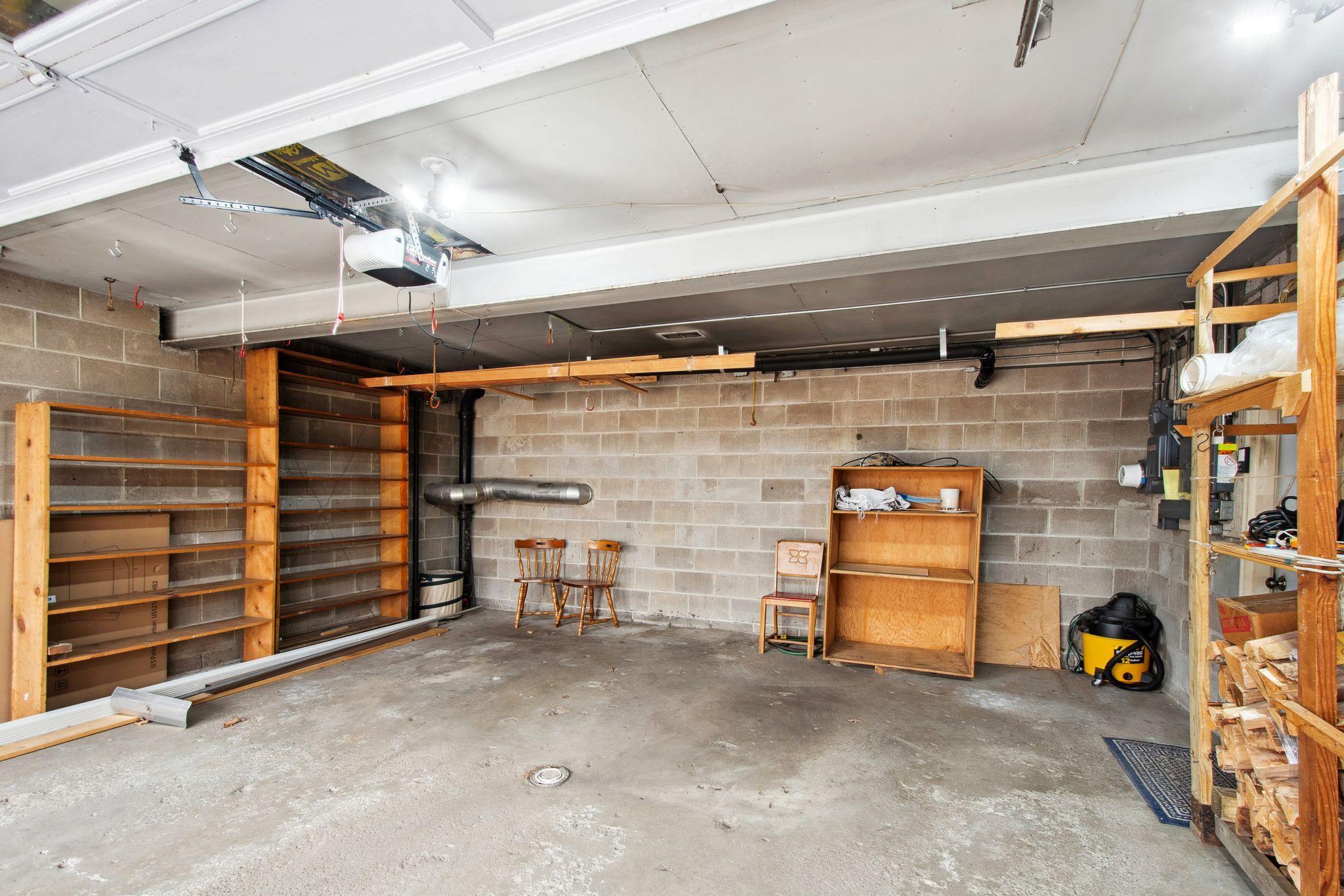 Two stall garage with storage shelves