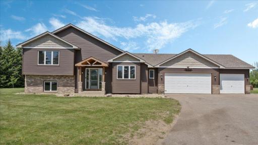 Maintenance free lap and shake vinyl siding and decorative brick
