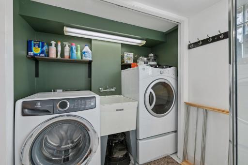 Laundry area is part of LL bathroom. Utility sink and overhead light.