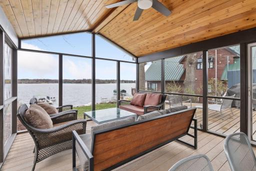 Screened porch with elevated views of the lake.