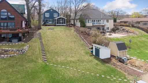 Steps down to the lake. Storage shed for all the water toys.