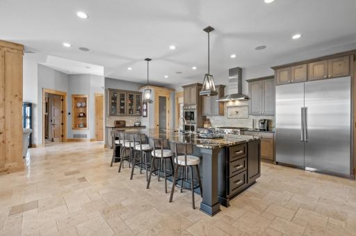Seating for 5 across an expansive solid stone center island