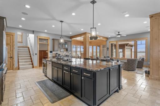 Integrated appliances keep this space highly functional while beautiful
