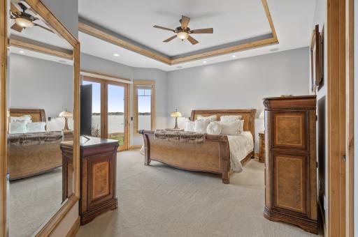 Gorgeous wood clad ceiling details add to the ambiance of this luxury lakeside ensuite