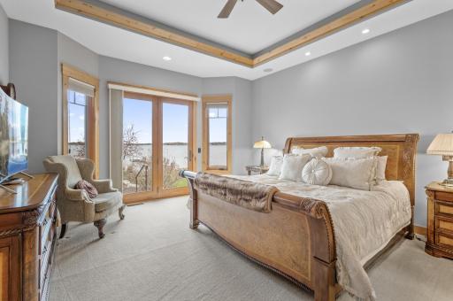 Wake up lakeside for years to come in this main floor primary suite