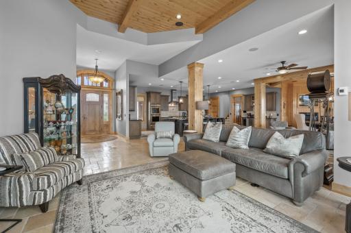 Spacious open floor plan under high ceilings