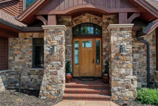 Grand stone entryway makes a stunning statement