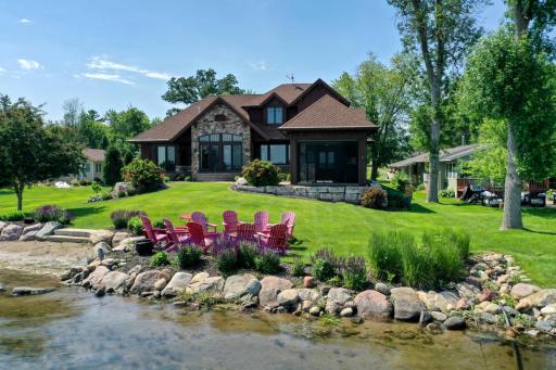 Enjoy evenings around the fire pit admiring the rip rap shoreline and beach