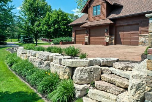 Exceptional hardscaping with easy access to the 3 car garage
