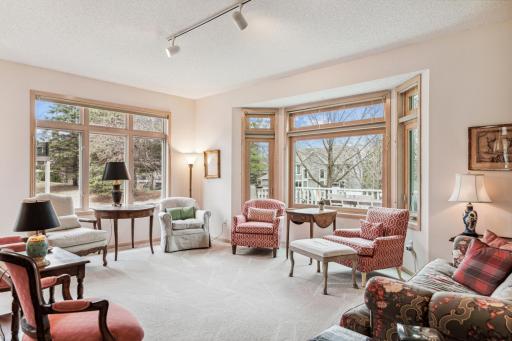 The main floor living room is flooded with natural light. Large open spaces for gatherings.