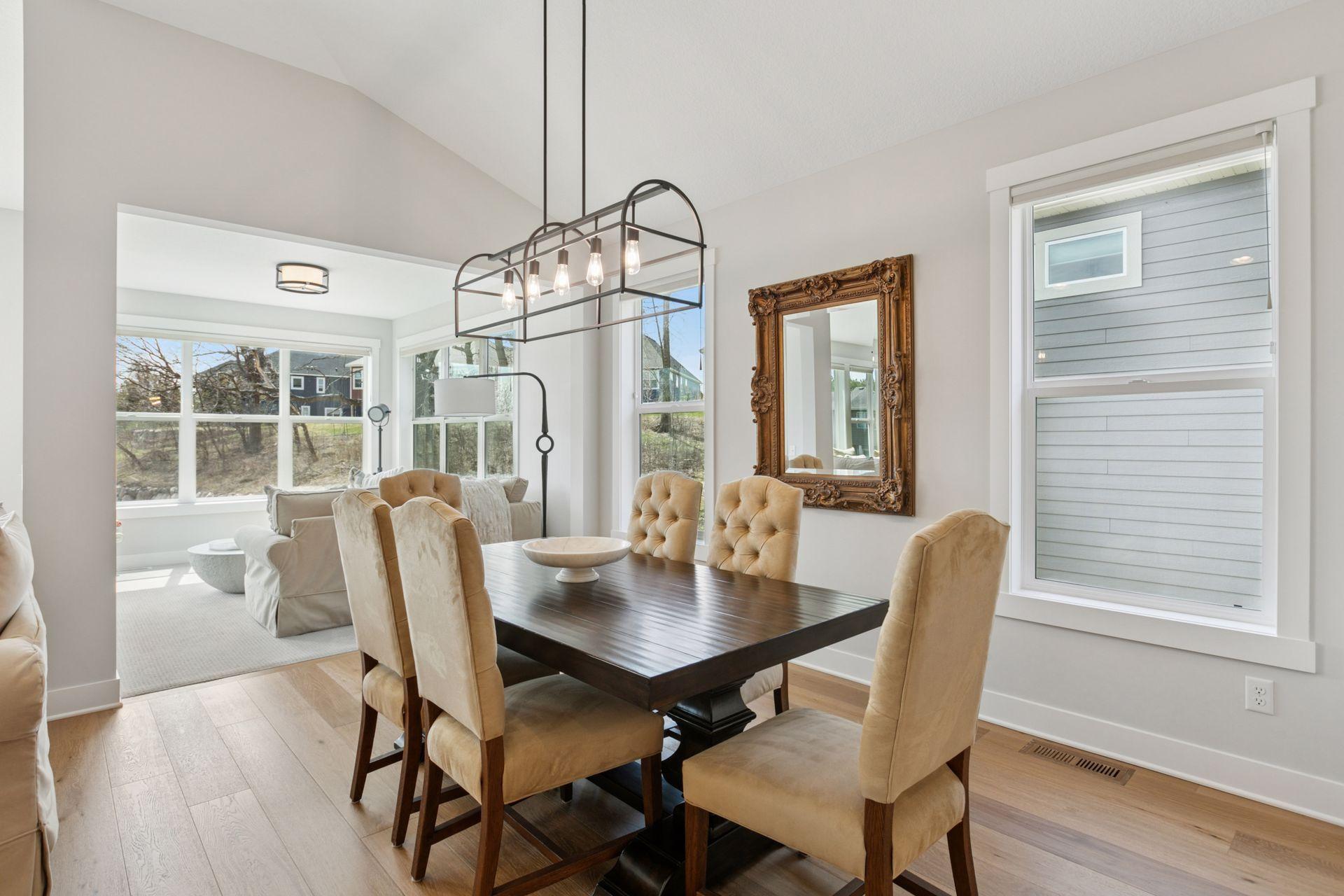 The adjacent dining area offers a seamless flow to the outdoors—perfect for gathering, entertaining, or simply enjoying the view.