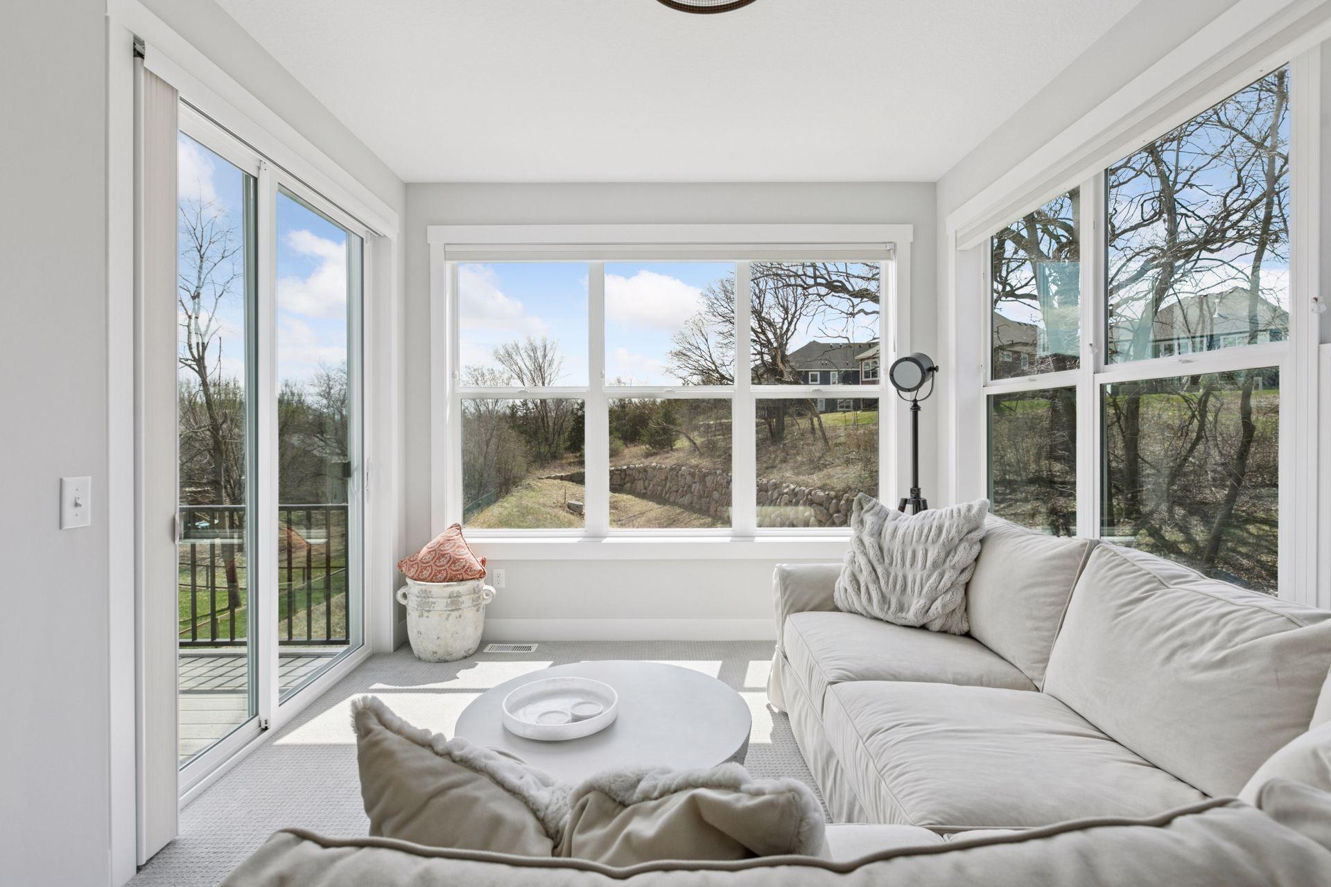 Step into the four-season porch and deck to enjoy peaceful views and frequent visits from neighborhood wildlife.
