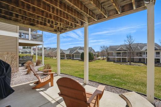Step out from the lower level to a covered patio overlooking the beautifully landscaped yardâoffering a peaceful outdoor space with plenty of room to relax or entertain.