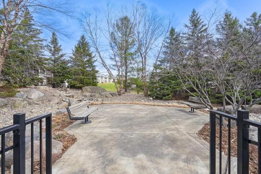 Enjoy access to a beautifully maintained common area just steps from the home, featuring park-like green space, walking paths, and serene surroundings perfect for relaxing or a leisurely stroll.