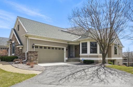 Welcome to this beautifully maintained former Pratt model home, located in a desirable Woodbury neighborhood with walking paths, lush landscaping, and exceptional curb appeal.