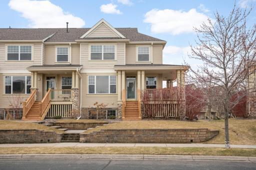 Welcome to 13775 54th Ave in Plymouth! This stunning end unit has a wrap-around porch with the feel of a single family home.