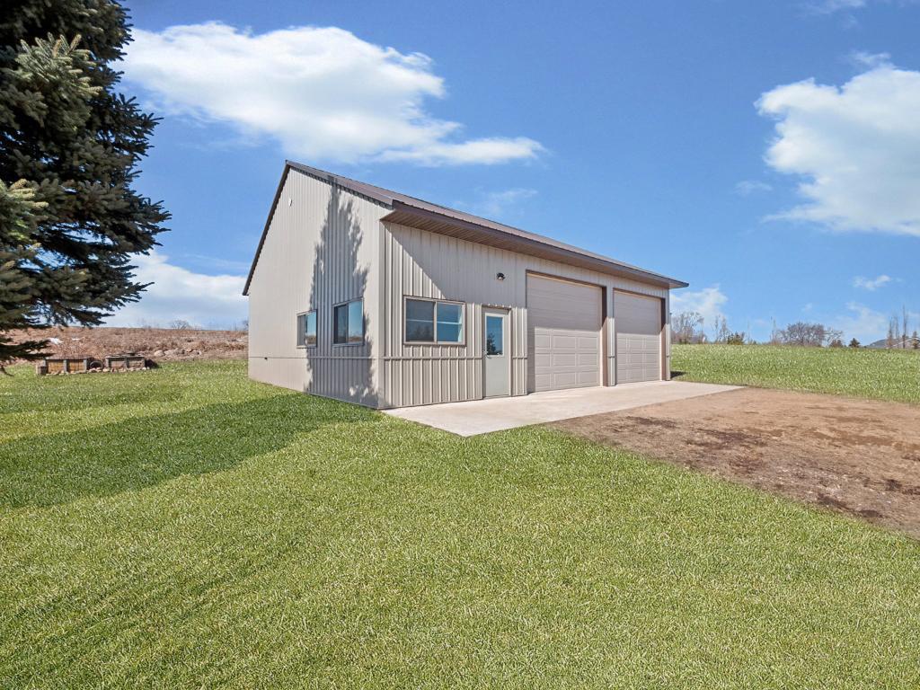 A rare find - a spacious 40 x 36 storage shed across the street from Lake Latoka!