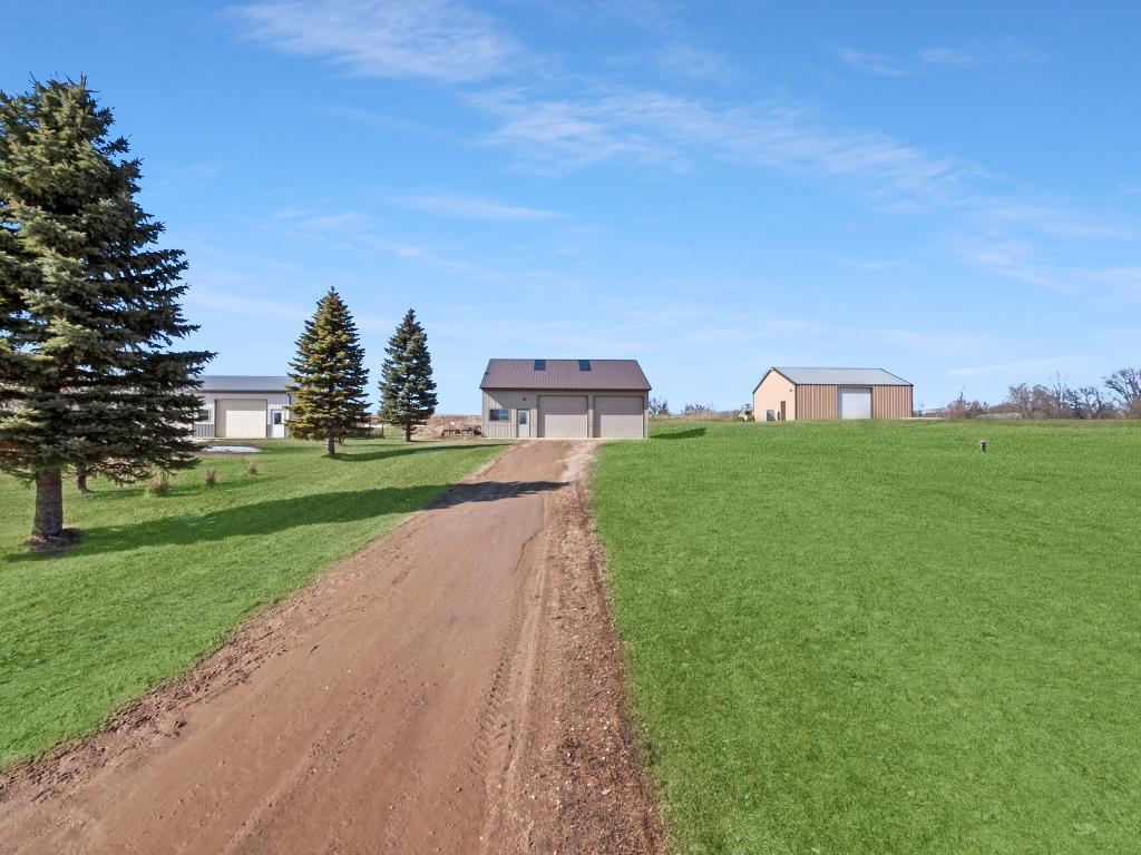 The shed was built on the back end of the .73 acre lot to allow for room to build your future home.