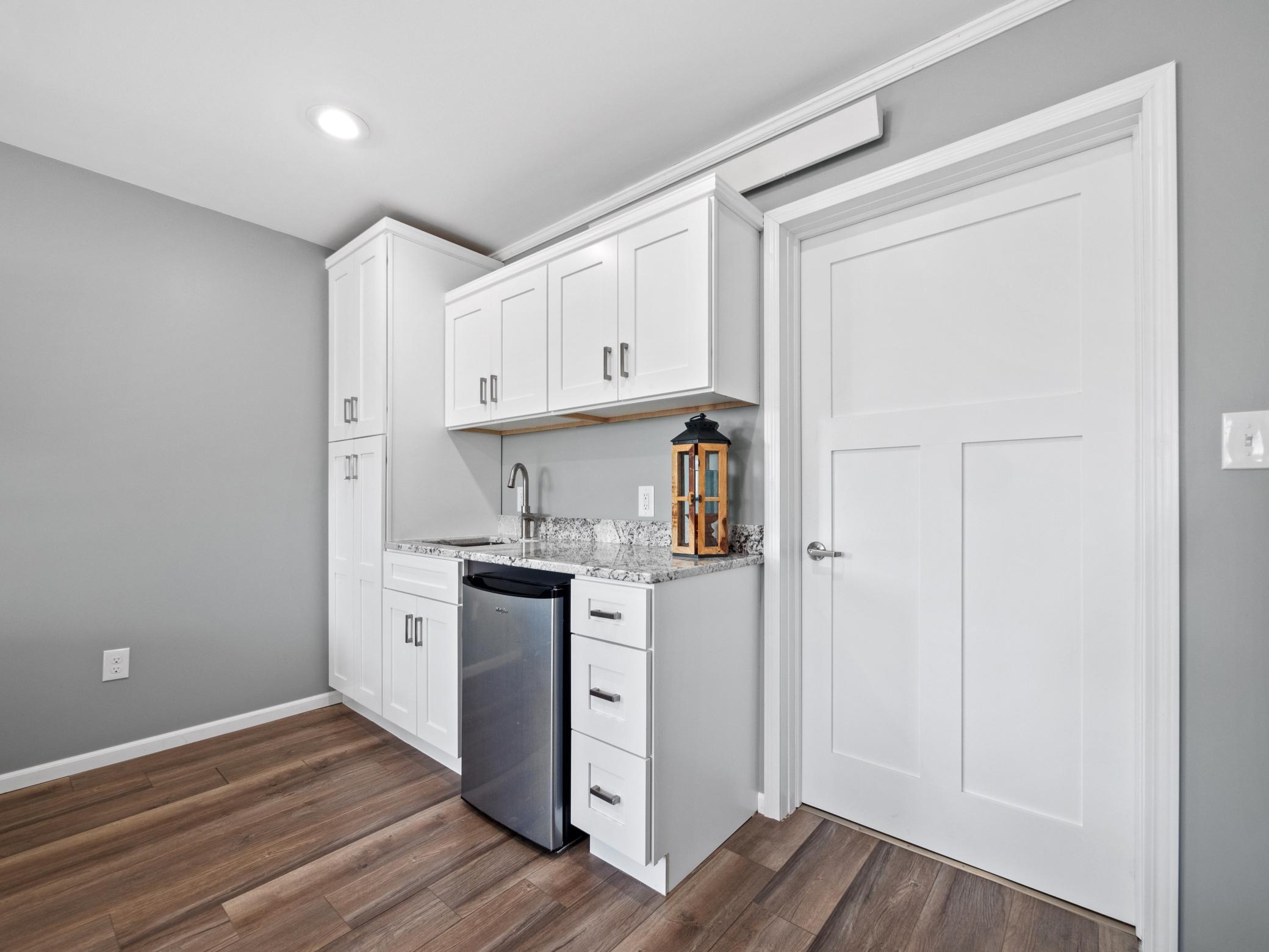 Includes a sink, fridge and brand new cabinets. Walk through the door to your bathroom.