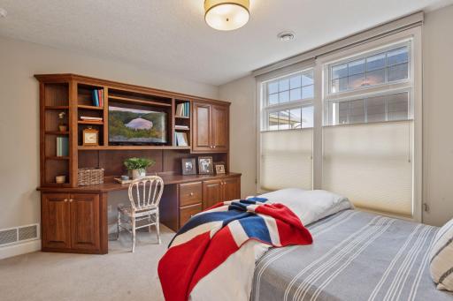 The second bedroom offers plenty of space, making it ideal for setting up an additional office area or a comfortable guest retreat.