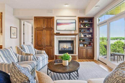 Cozy up by the fireplace in this elegant living room
