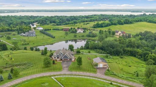 Nestled on 5+ acres of gently rolling hills and situated on a quiet cul-de-sac, this welcoming home awaits.