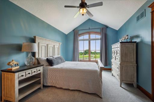 The second Junior Bedroom offers a vaulted ceiling and long views over the front yard.