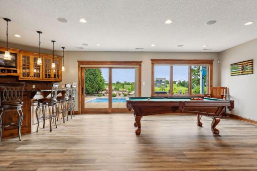 New LVT flooring has been installed throughout the lower level - including in the Billiard Room.