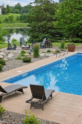 After a day in the pool, gather around the custom campfire.