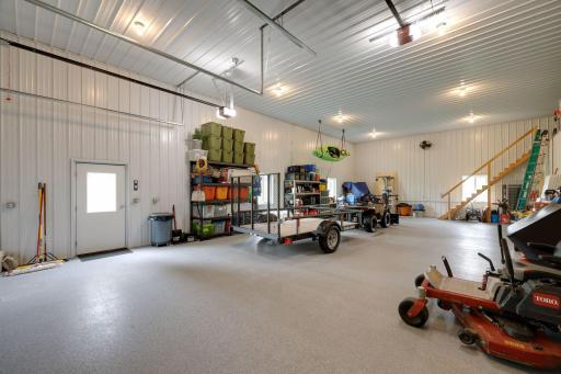 The outbuilding enjoys radiant in-floor heating an polyaspartic flooring.