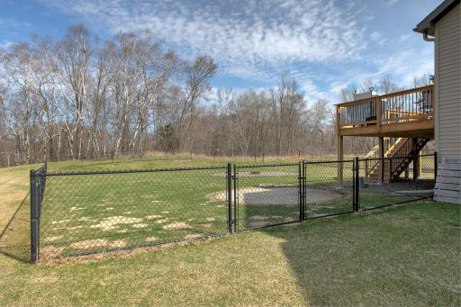 Backyard is fully fenced with a 10' drive-through gate!