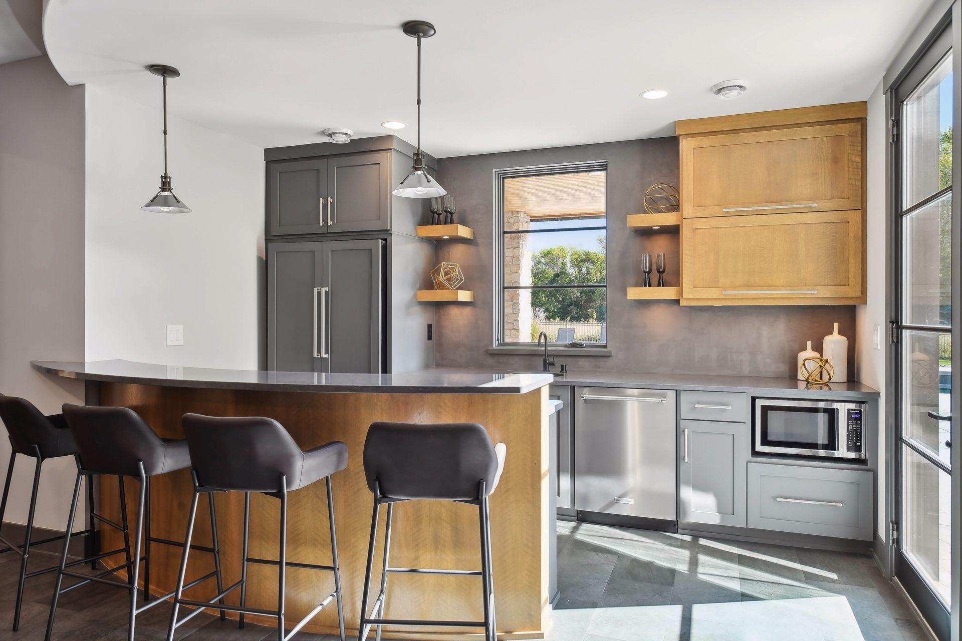 The basement bar & kitchen is ready for your next gathering.