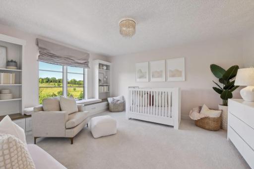 The third bedroom also has a walk in closet, as well as an adorable bench seating and storage under the window.