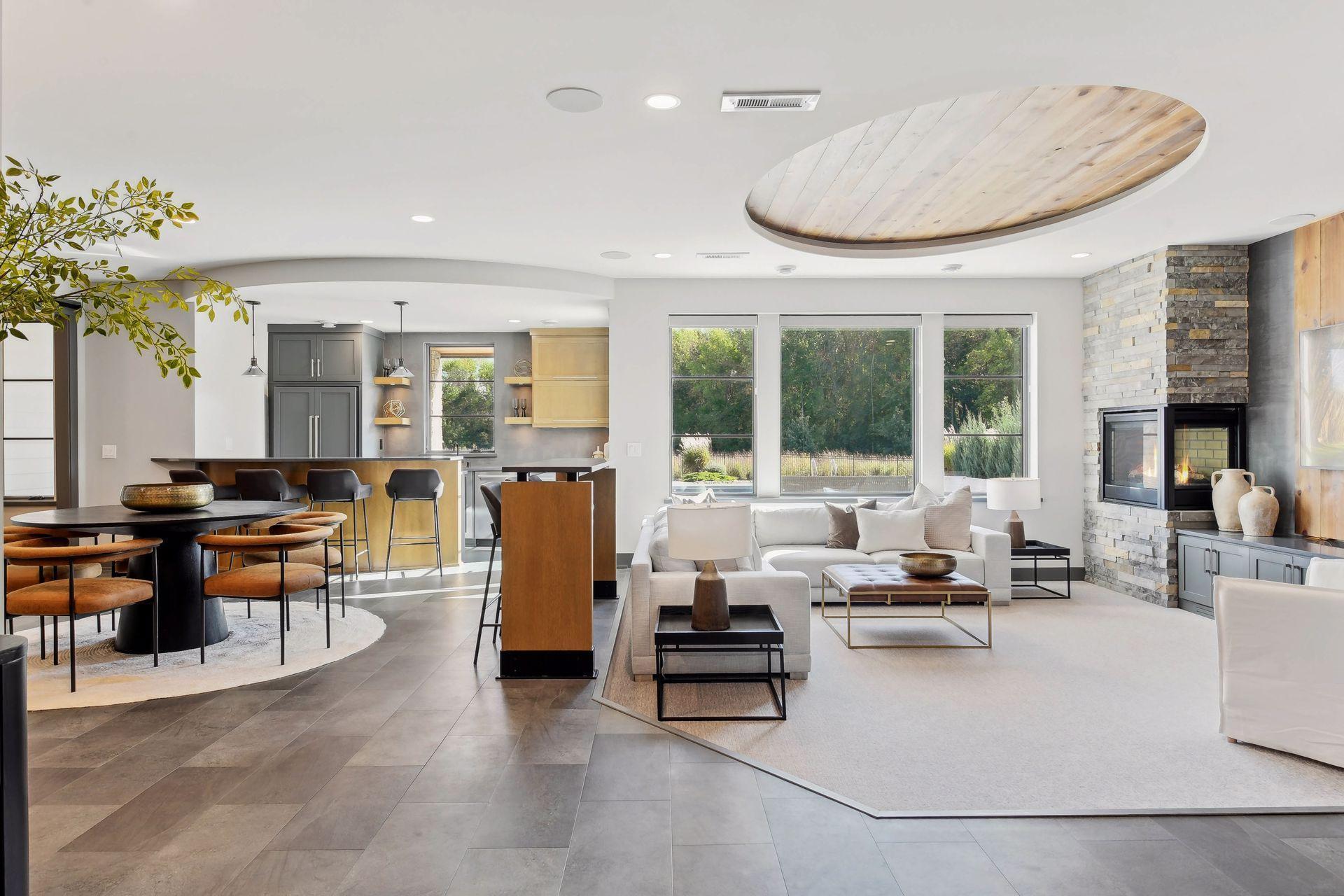 From the extra wood detailing on the ceiling, to the matching shiplap behind the television, to the kitchen - this basement is a showstopper with plenty of seating options for all of your hosting.