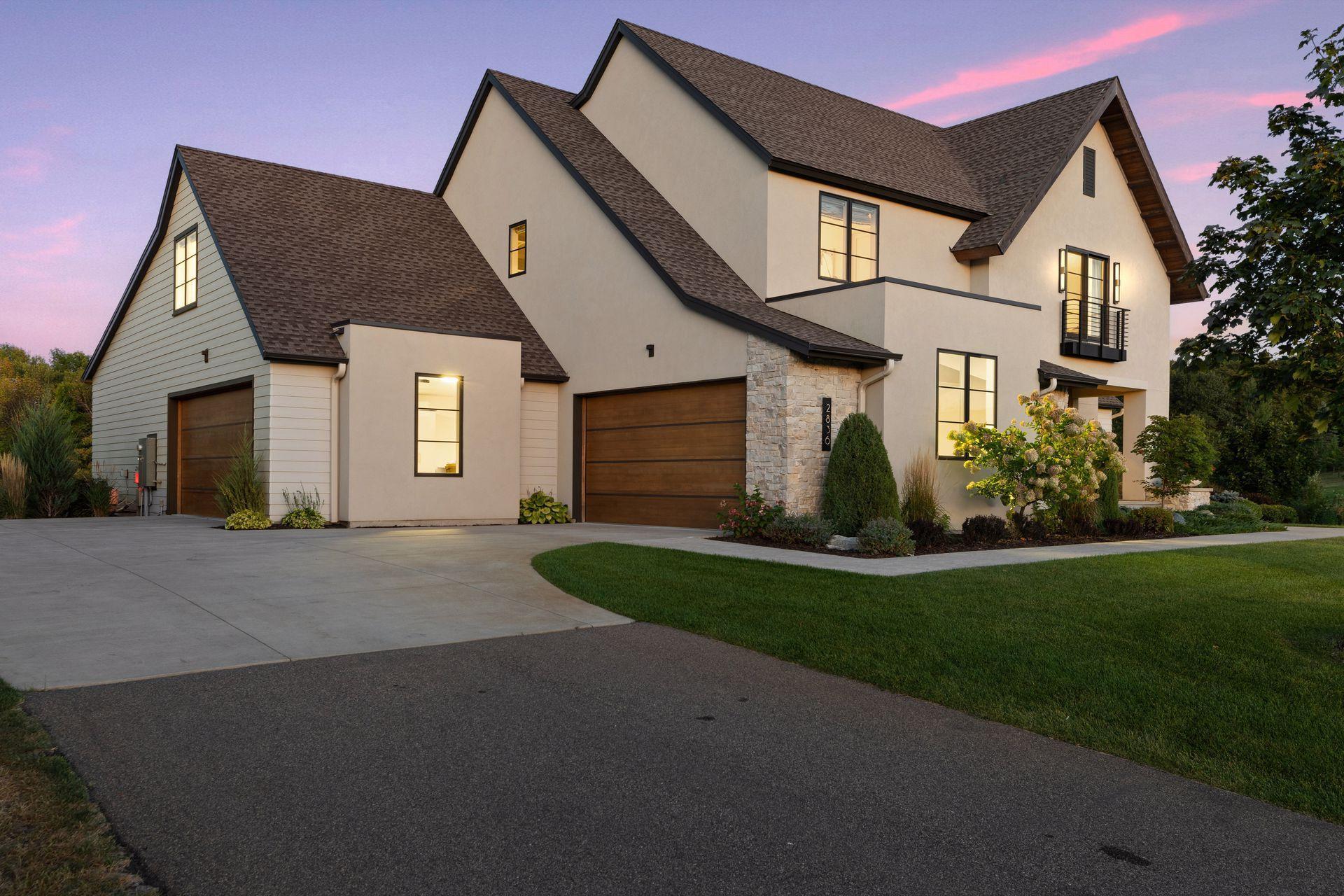 The front porch is a friendly entrance & a cozy spot to watch the sunset.