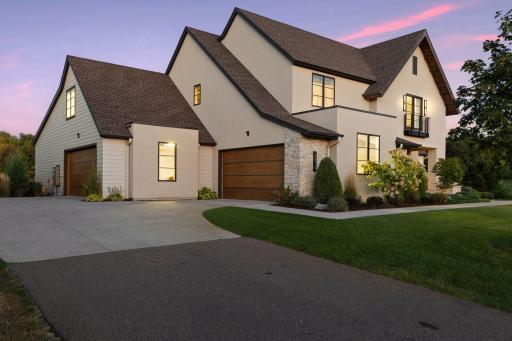The front porch is a friendly entrance & a cozy spot to watch the sunset.