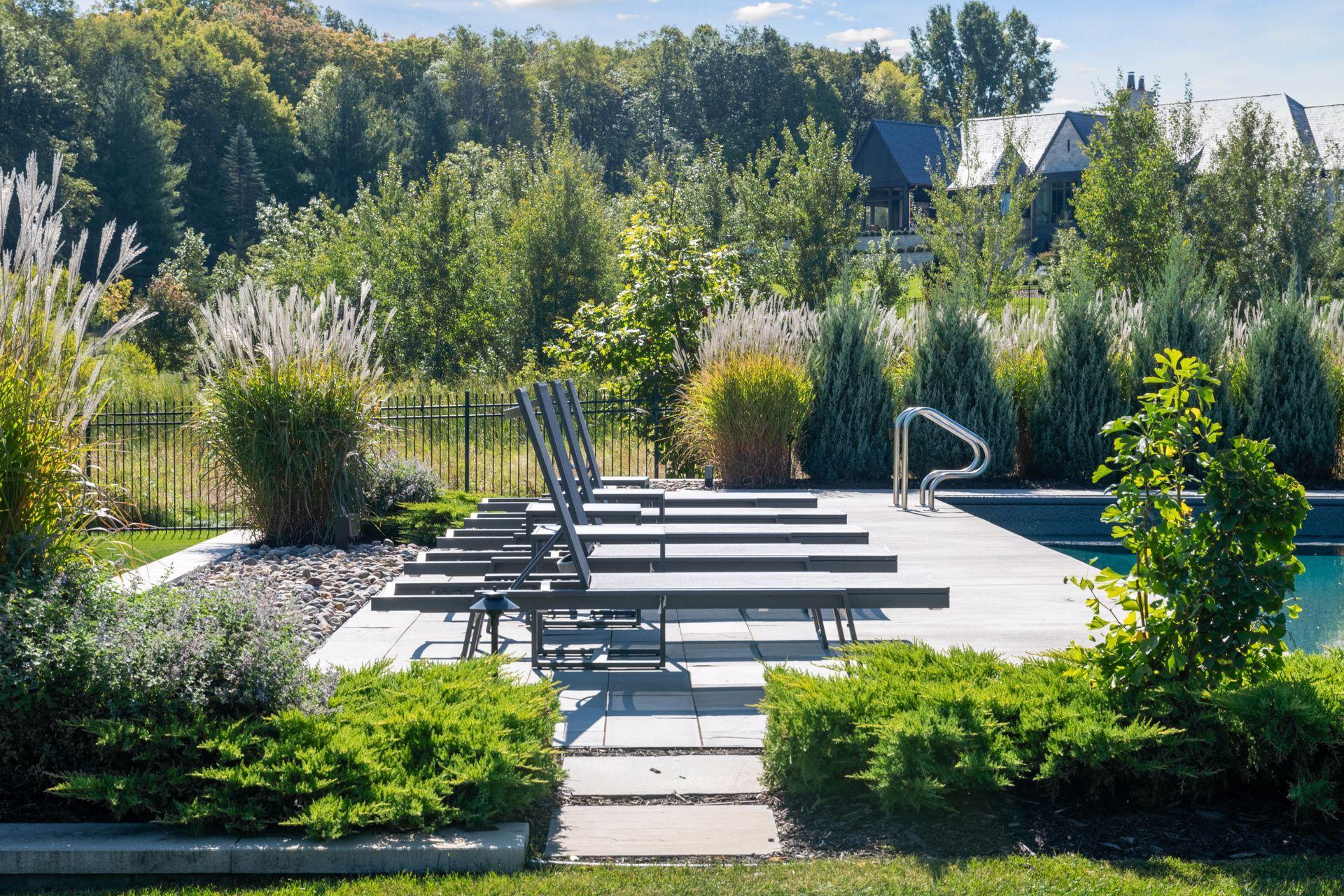 Landscaping has a focus on privacy & blending with the preserve.