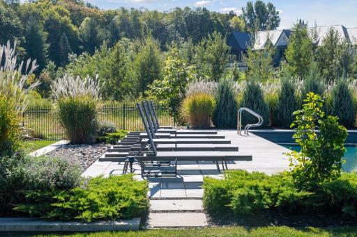 Landscaping has a focus on privacy & blending with the preserve.