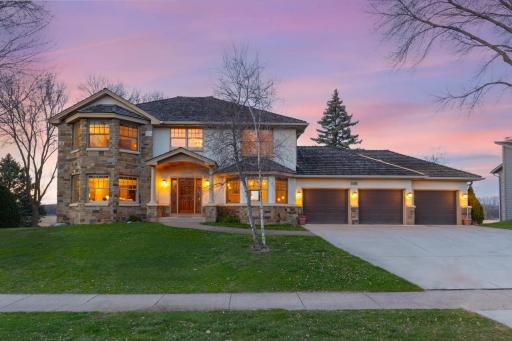 Exquisite hidden gem perfectly nestled on a serene and private 0.44-acre lot in the coveted Olympic Hills Golf Club community.
