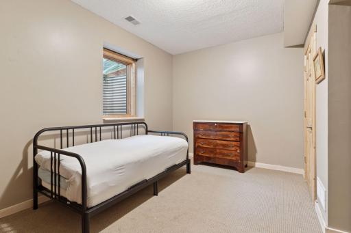 One of two lower level bedrooms.
