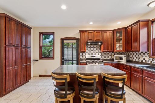 Fabulous eat-in kitchen with excellent cabinet and storage space.