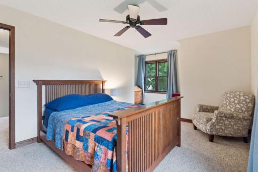 One of three upper level bedrooms. Primary bedroom with walk-in closet.