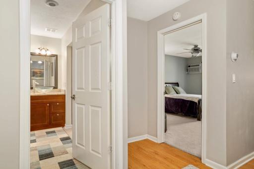 Bath and bedroom are adjacent to each other.