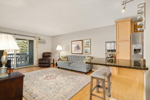 A great flow from the kitchen to the living space and out to the covered deck.