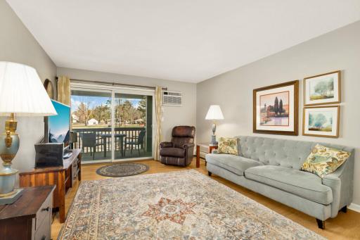 A perfect size living space that brings the outside in through oversized patio doors.