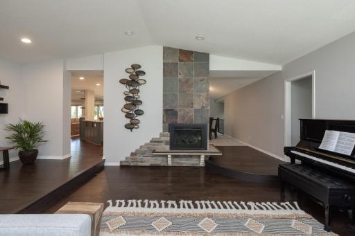 20 x 15 living room with updated manufactured HW floors and vaulted ceilings