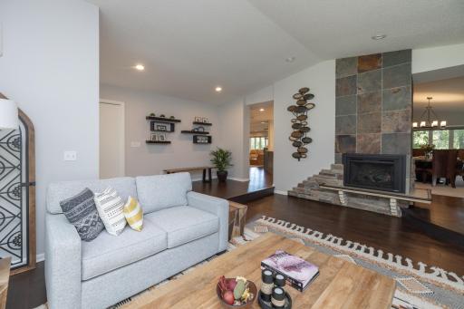 Beautiful gas fireplace with floor to ceiling slate wall